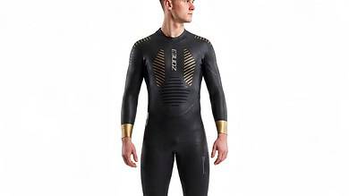 Male athlete wearing a black and gold triathlon compression suit, designed for optimal performance and aerodynamics in triathlon races.